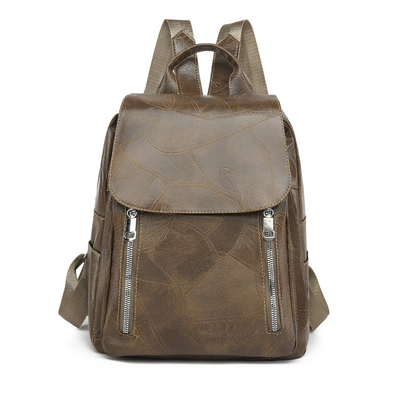 Diebstahlsicherer Lederrucksack für Damen, elegant in Braun, mit verstellbaren Trägern und robusten Reißverschlüssen.