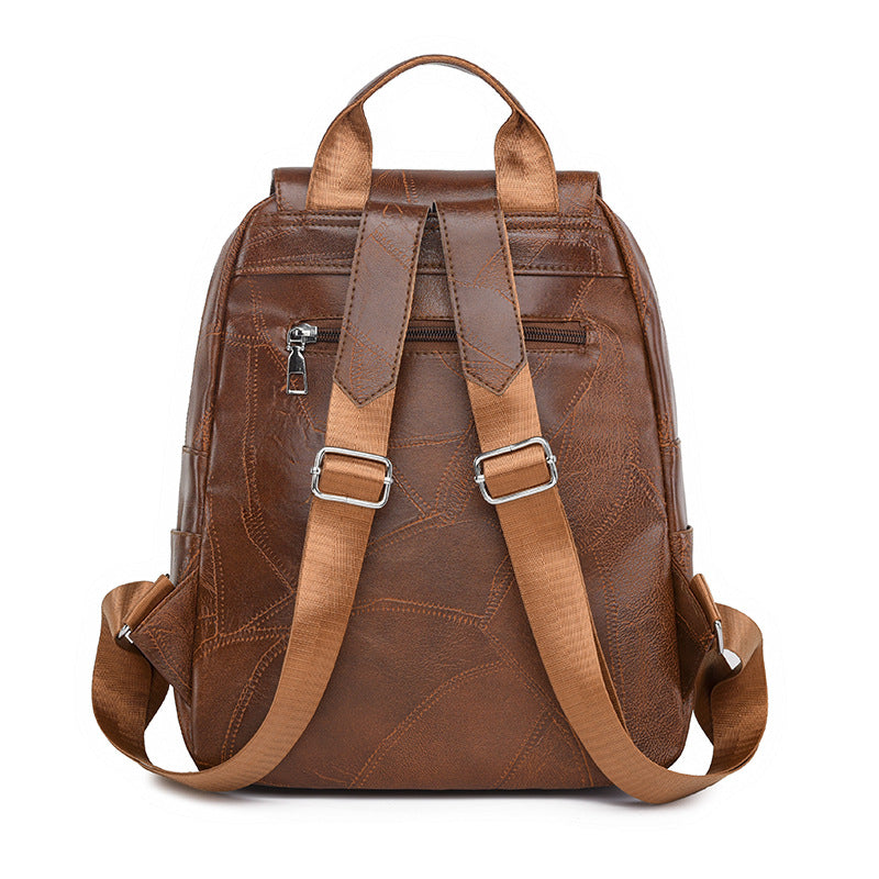 Diebstahlsicherer Lederrucksack für Damen, elegant in Braun, mit verstellbaren Trägern und robusten Reißverschlüssen.