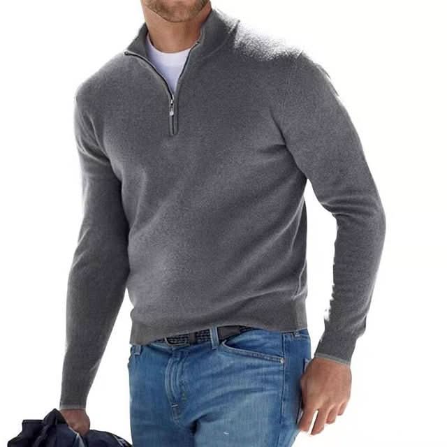 Eleganter Merino Herrenpullover mit V-Ausschnitt, Reißverschluss, und weicher Merinowolle für stilvollen Komfort.