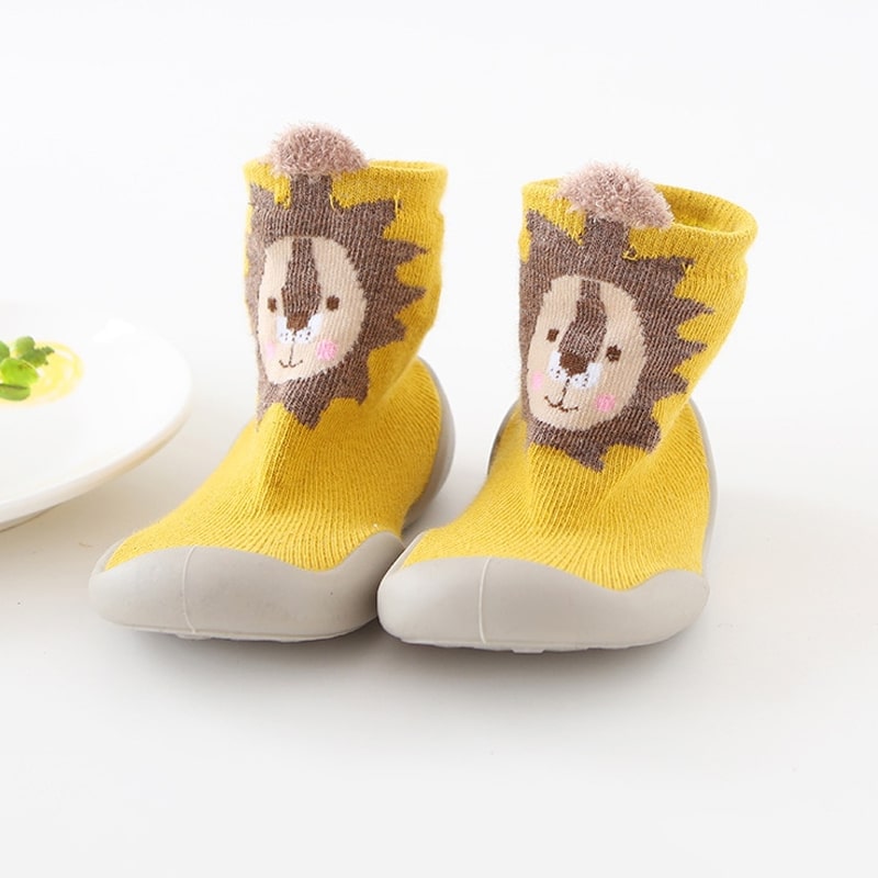 "Gelbe Fuchs-Babyschuhe mit rutschfester Sohle, ergonomischem Design und atmungsaktiven Materialien, ideal für kleine Abenteu