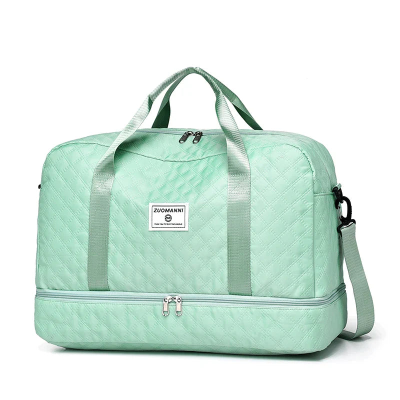 Große faltbare Reisetasche mit Rautenmuster aus wasserabweisendem Nylon, ideal für Kurztrips und geordnetes Packen.