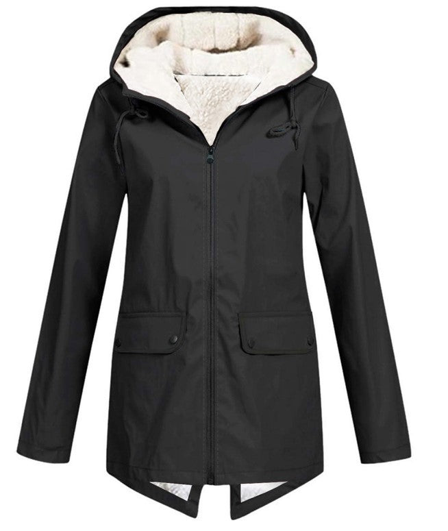 Wasserdichte Damen Regenjacke mit Fleece-Futter, verstellbarer Kapuze und Taschen in elegantem Blau für Outdoor-Abenteuer.