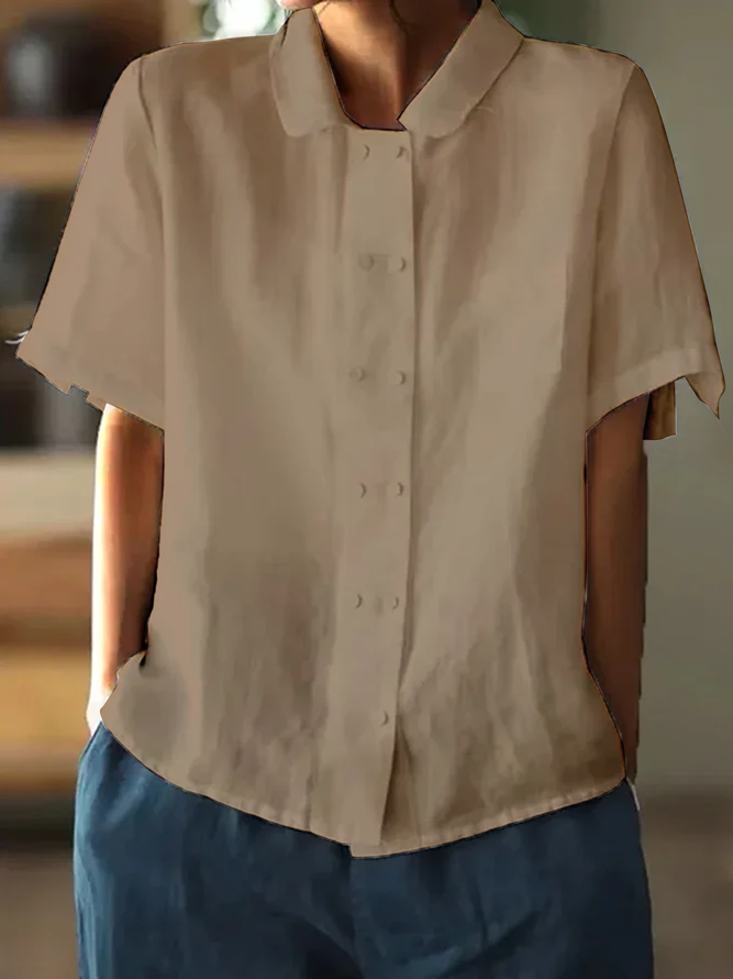 Weiße luftige Bluse mit kurzen Ärmeln, aus Baumwolle, lockerer Schnitt, elegantes und zeitloses Design für Damen.