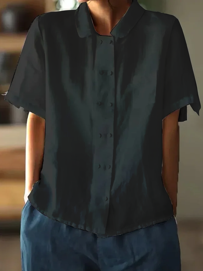 Weiße luftige Bluse mit kurzen Ärmeln, aus Baumwolle, lockerer Schnitt, elegantes und zeitloses Design für Damen.