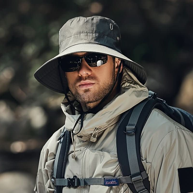 Pustende solhatt med UV-beskyttelse, justerbar passform og bred brem, ideell for utendørseventyr.