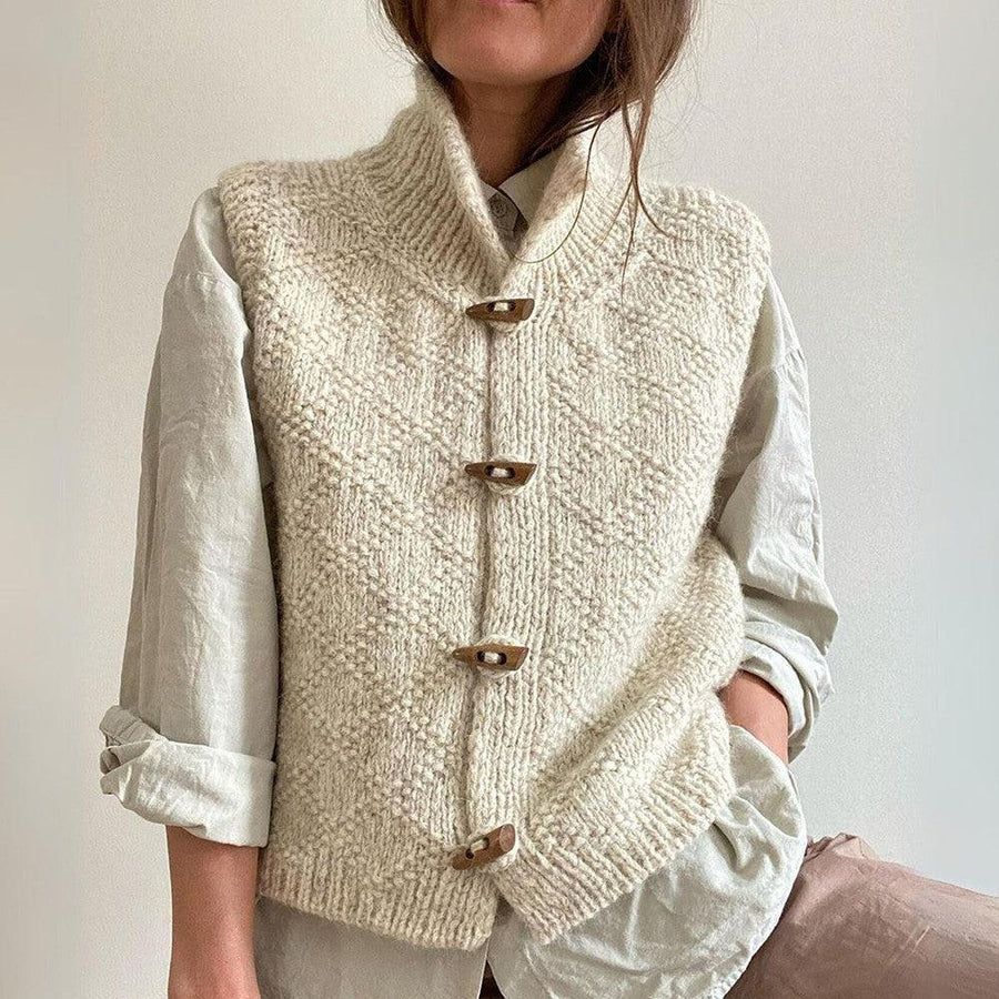 "Damen Strickweste beige, vielseitig kombinierbar, stilvolle Strickdetails, perfekt für Layering mit Kleider und Blusen."