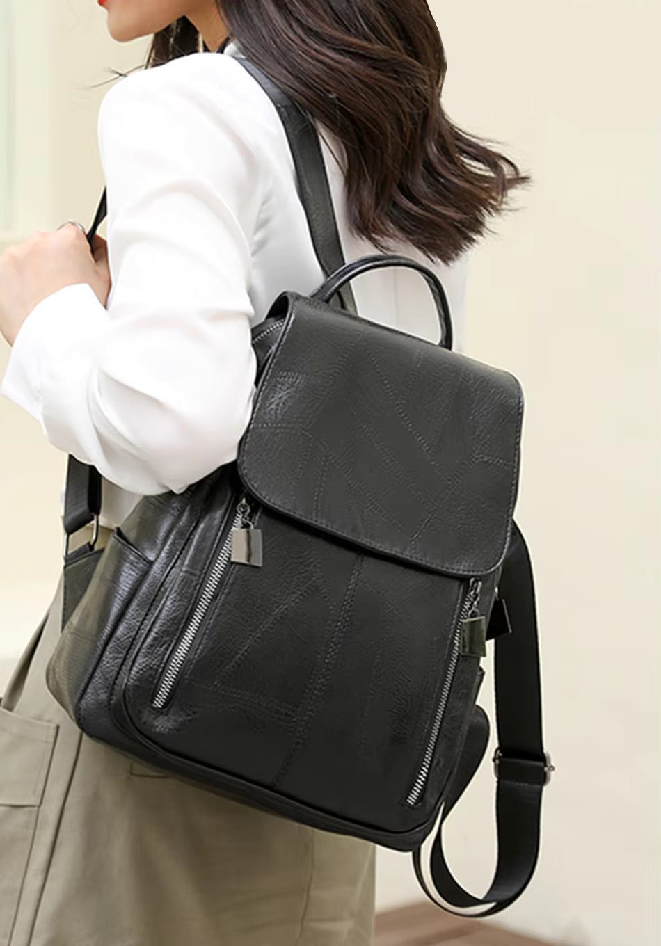 Diebstahlsicherer Lederrucksack für Damen, elegant in Braun, mit verstellbaren Trägern und robusten Reißverschlüssen.