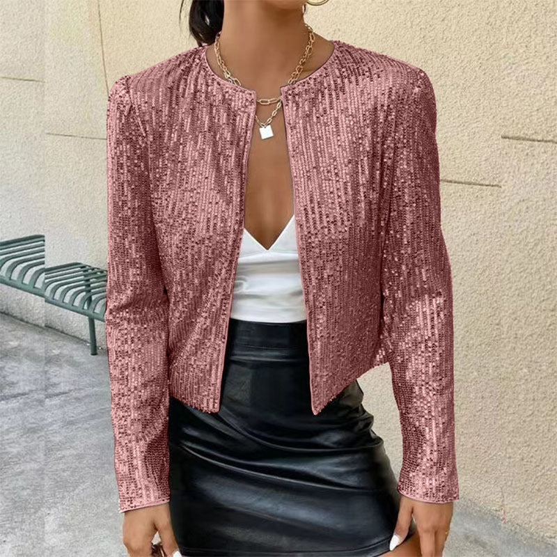 "Elegante glitzernde Damenjacke mit taillierter Passform, ideal für festliche Anlässe, in Silber und Magenta erhältlich."