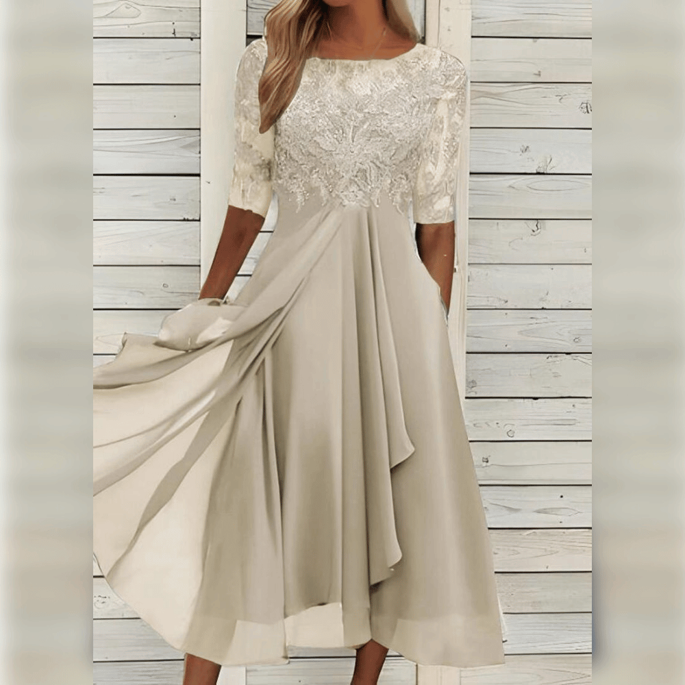 Elegantes Chiffon-Midikleid mit Rundhalsausschnitt, hoher Taille und kurzen Ärmeln, perfekt für besondere Anlässe.