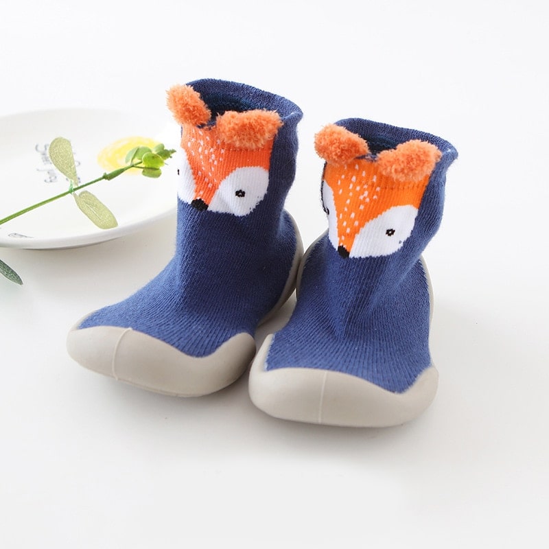 "Gelbe Fuchs-Babyschuhe mit rutschfester Sohle, ergonomischem Design und atmungsaktiven Materialien, ideal für kleine Abenteu