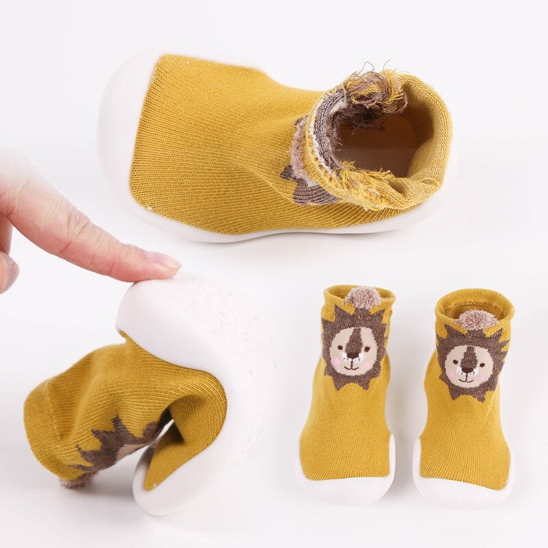 "Gelbe Fuchs-Babyschuhe mit rutschfester Sohle, ergonomischem Design und atmungsaktiven Materialien, ideal für kleine Abenteu