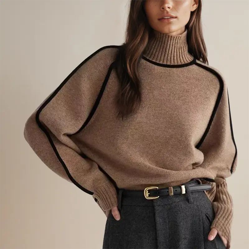 "Luxe Rollkragenpullover in Braun, elegant gestrickt, ideal für Herbst und Winter; warmhaltend und stilvoll."